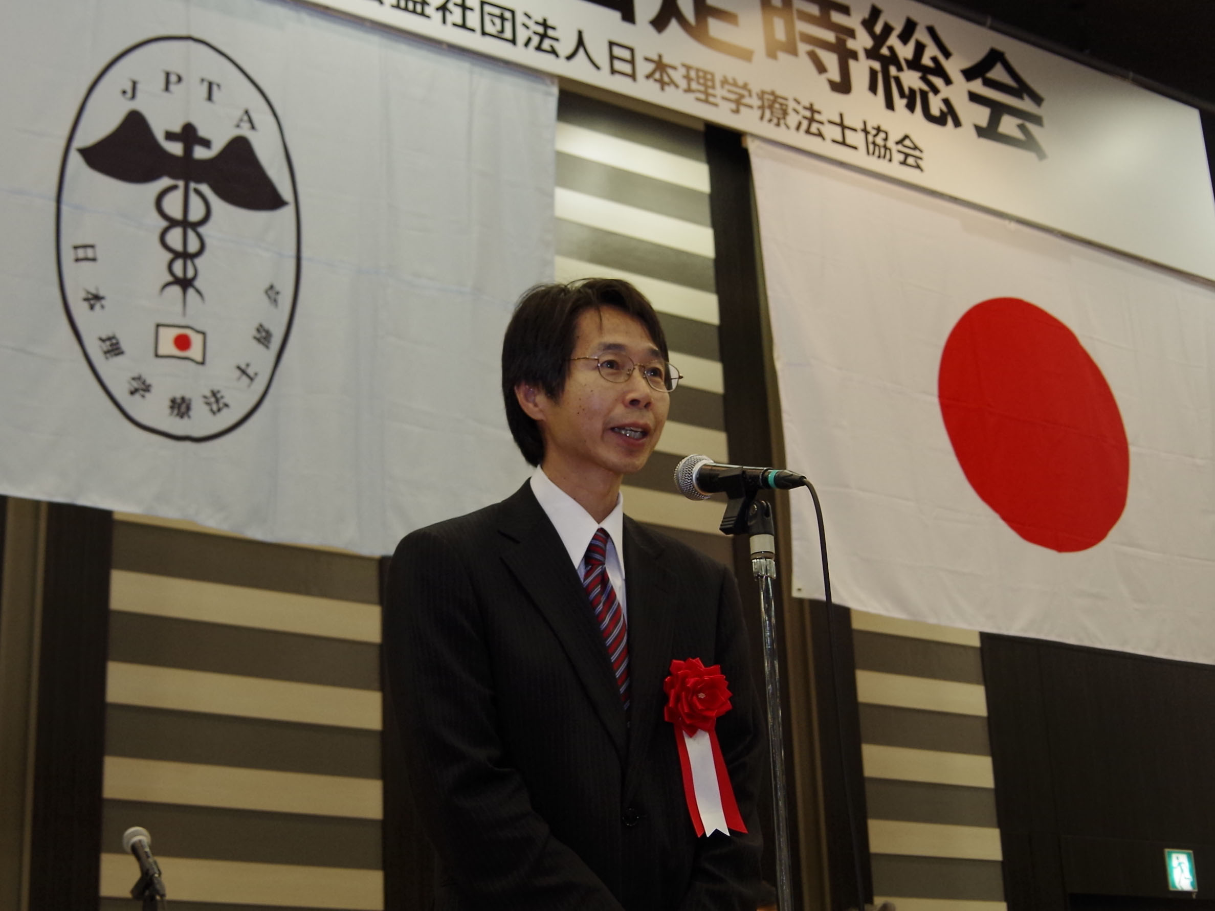 祝辞を代読する武井氏